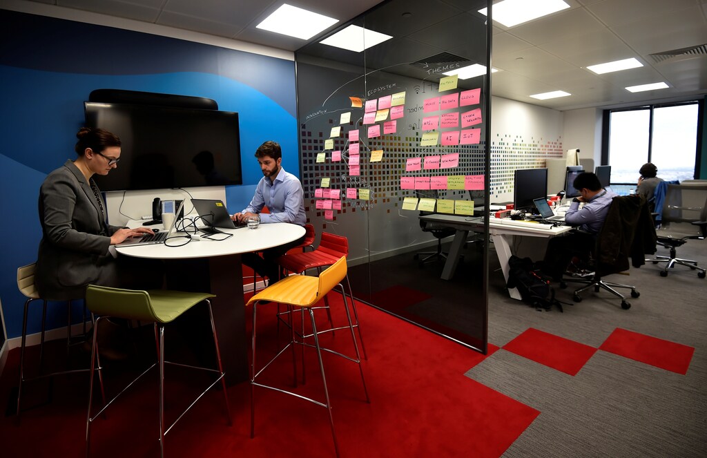 UBS employees work in the UBS "fintech lab" at Canary Wharf in London, Britain, October 19, 2016. REUTERS/Hannah McKay - RTX2PJJ3
