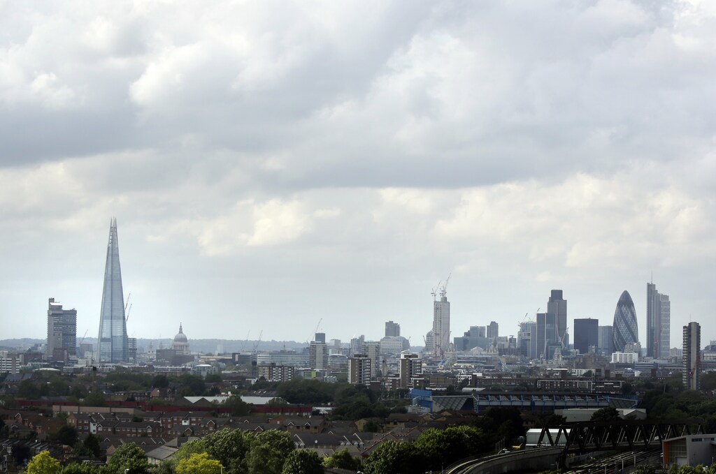 The Shard skyscraper and Saint Paul's Cathedral are seen in a view of the London skyline from south London June 16, 2012. The Shark skyscraper, a 95-storey Renzo Piano-designed glass tower, with views across London's financial district and the landmark St Paul's Cathedral, is due to be completed in 2012 and will be the tallest tower in western Europe. Picture taken June 16, 2012. REUTERS/Kevin Coombs (BRITAIN - Tags: BUSINESS REAL ESTATE) - GM1E86I17YG01