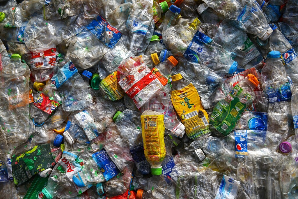 Pressed plastic waste ready for loading is seen at the Prabkaya Recycle Factory in Pathum Thani outside Bangkok, Thailand, June 7, 2017. REUTERS/Athit Perawongmetha - RC1EA1EA34F0