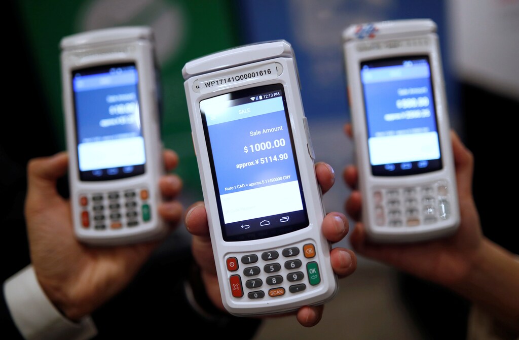 High security digital payment units that automatically convert Chinese yuan payments into Canadian dollars.