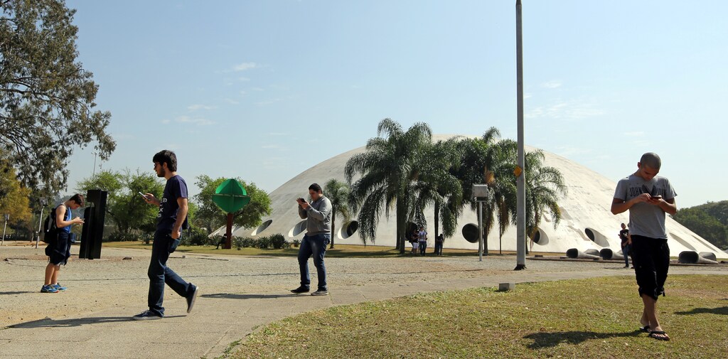 People play the augmented reality mobile game "Pokemon Go" at Ibirapuera park in Sao Paulo, Brazil, August 5, 2016