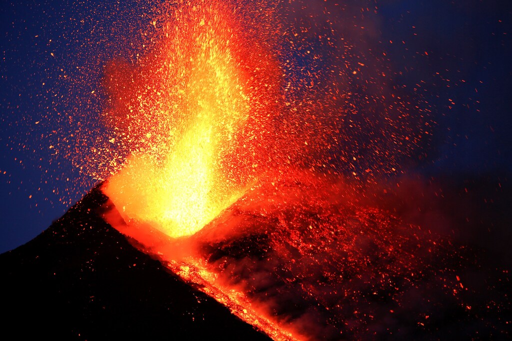Italy's Mount Etna, Europe's tallest and most active volcano, spews lava as it erupts on the southern island of Sicily, Italy February 28, 2017. Picture taken February 28, 2017. REUTERS/Antonio Parrinello - RC13D9084F50