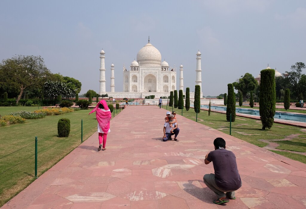 A man gets his photograph taken in front of Taj Mahal after authorities reopened the monument to visitors, amidst the coronavirus disease (COVID-19) outbreak, in Agra, India, September 21, 2020. REUTERS/Alasdair Pal