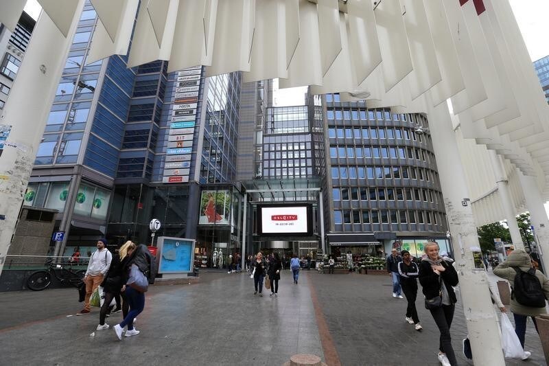 People gather next to the Oslo City shopping center in Oslo, Norway, June 3, 2017. REUTERS/Ints Kalnins - RC125BC18F10