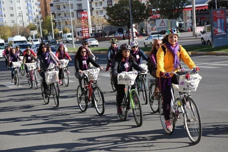 Women cycle to mark the International Day for the U.N. Elimination of Violence Against Women in Diyarbakir, Turkey, November 25, 2017.