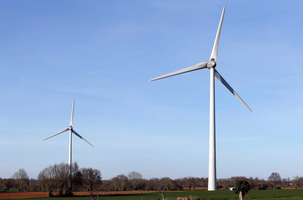 A view shows wind turbines above fields in Champdeniers, France, March 14, 2017. Picture taken March 14, 2017. REUTERS/Regis Duvignau - RTX3136Y