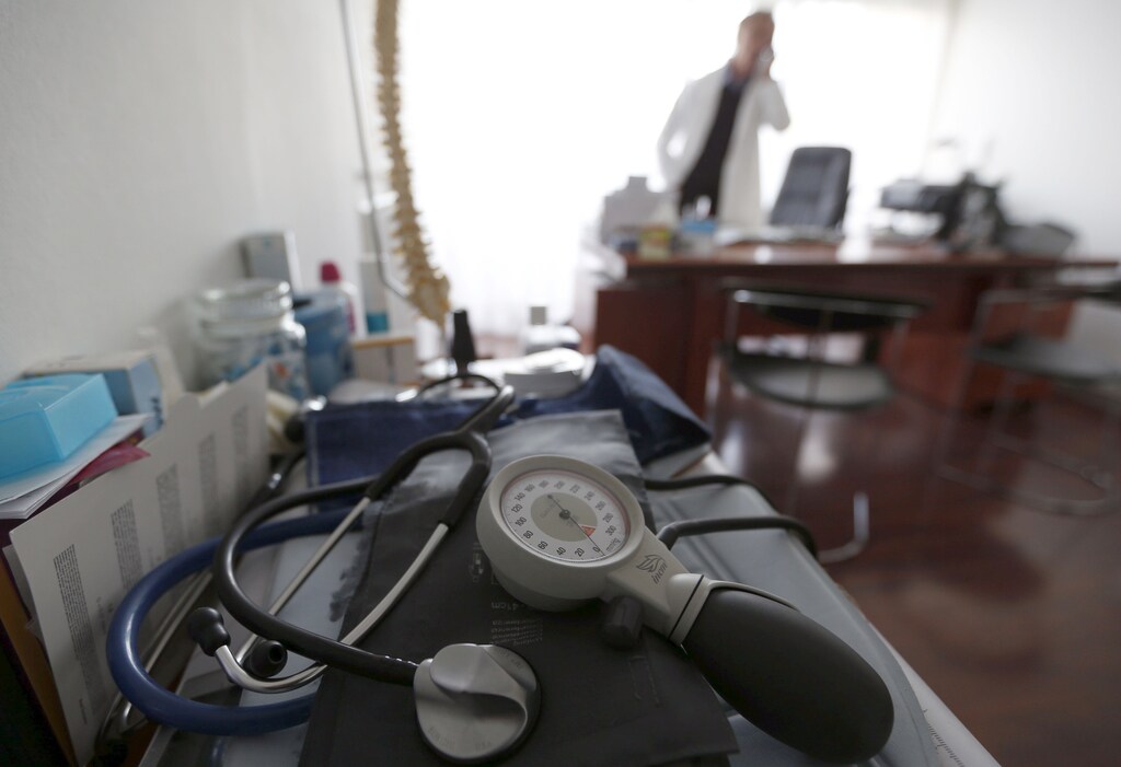 A photo illustration shows a stethoscope and blood-pressure machine as a French general practitioner works in a doctor's office in Bordeaux January 7, 2015. French physicians protest against a new health reform bill that would introduce a third party payment system. Picture taken January 7, 2015. REUTERS/Regis Duvignau (FRANCE - Tags: HEALTH POLITICS) - PM1EB171G6H01