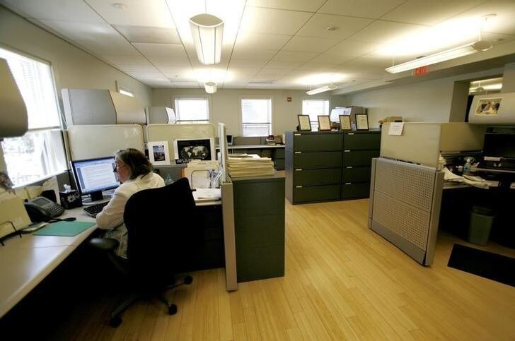Office space with bamboo floors in the first "green" building on Capitol Hill in Washington July 12, 2007. The Friends Committee on National Legislation (FCNL) Green Building is the office for the Quaker lobby group in Washington. The building, which has been transformed from two historic Civil War era row houses, is being described as an example of practical ways to protect the environment by reducing energy consumption. REUTERS/Kevin Lamarque (UNITED STATES)