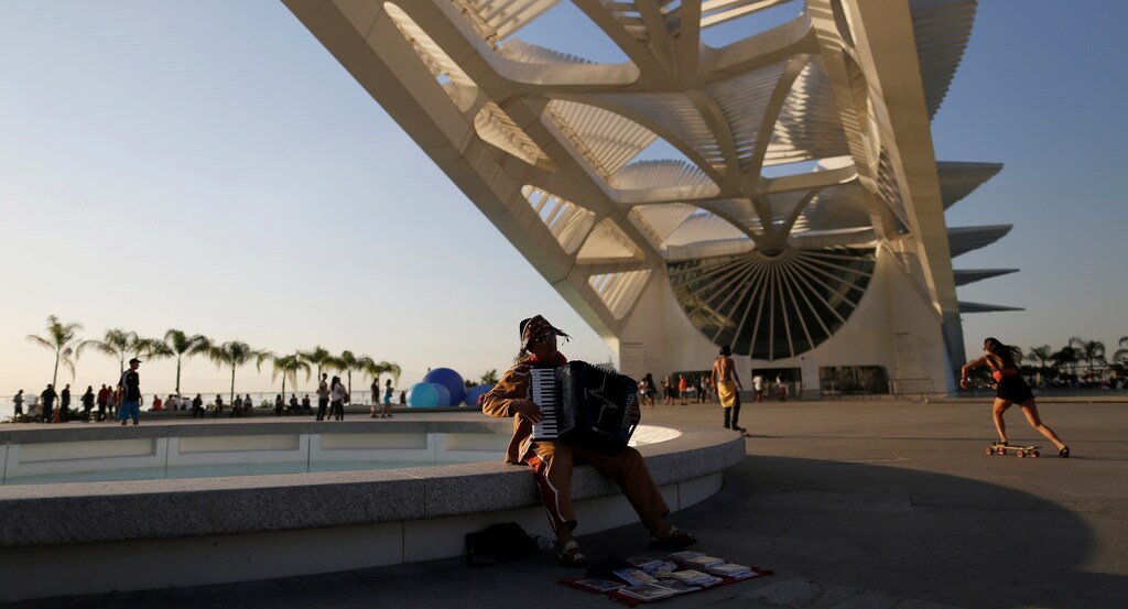 An accordionist is pictured in front of the Museum of Tomorrow in Rio de Janeiro, Brazil, July 12, 2016.