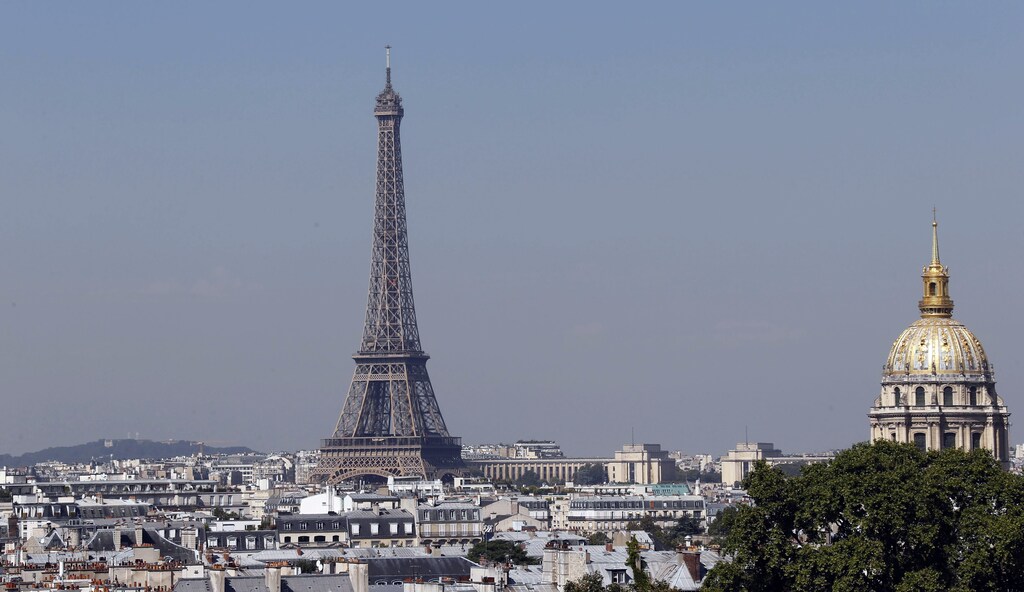 General view of the Eiffel Tower during a hot summer day in Paris, France, August 26, 2016. REUTERS/Regis Duvignau - RTX2N9OE
