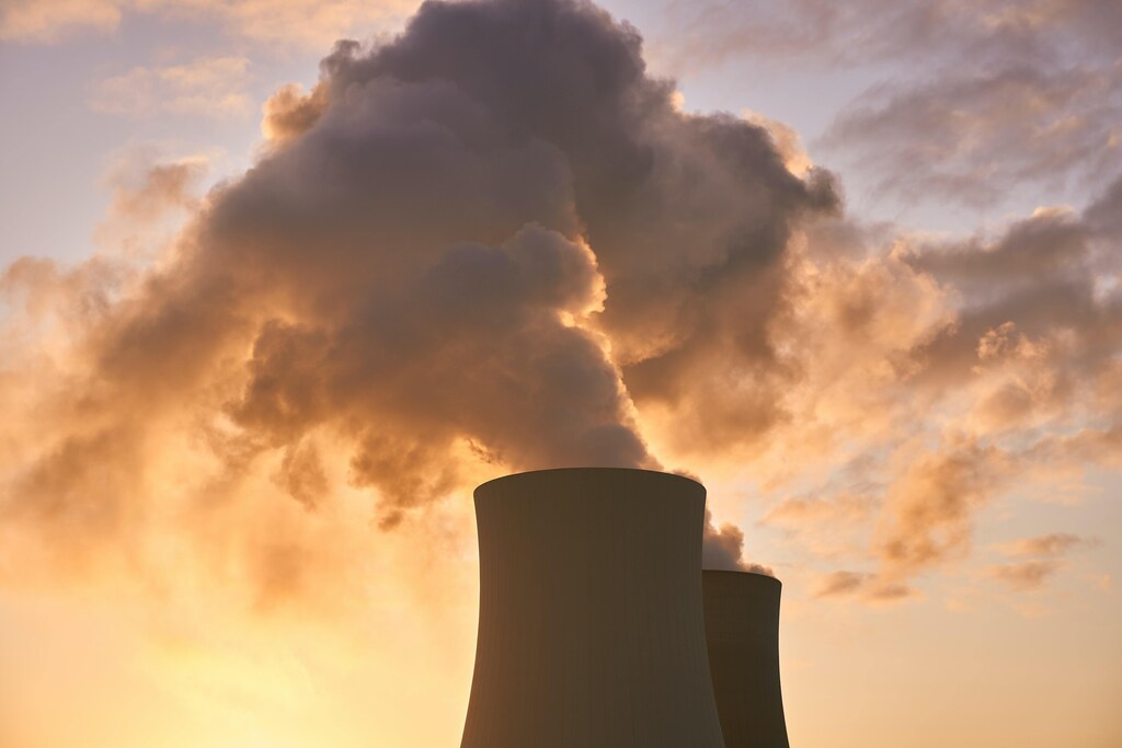 View of emissions coming out of power plant.