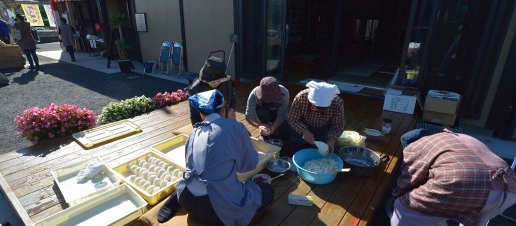 Local women cooking for the community hub while recovering from the Great East Japan Earthquake