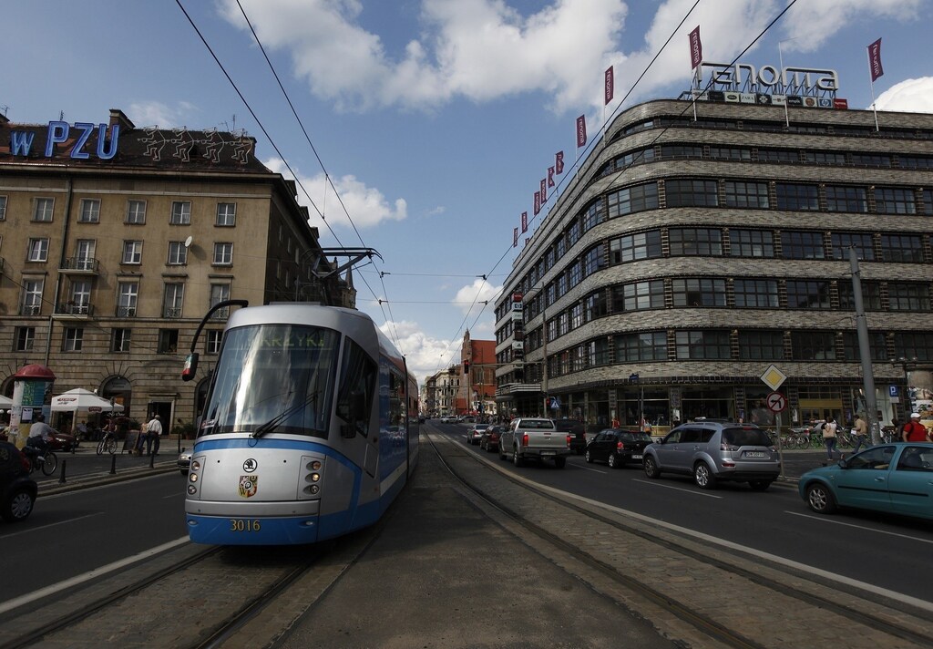 A tram travels through the central shopping district of Wroclaw, southern-western Poland, July 28, 2011. Wroclaw is one of the four Polish venues where next year EURO 2012 soccer championships will be hosted. REUTERS/Kacper Pempel (POLAND - Tags: BUSINESS CONSTRUCTION SPORT SOCCER) - RTR2PQIF