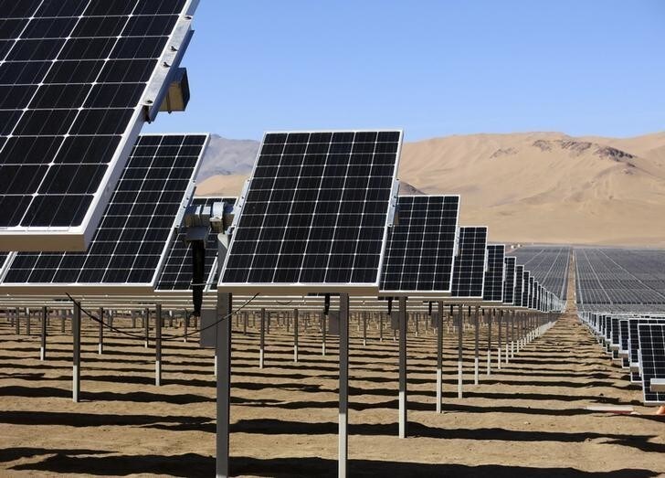 Solar panels of local mining company CAP are seen in the Atacama Desert June 5, 2014. CAP inaugurated the largest solar plant in Latin America with an area equivalent to 200 football fields and to generate enough power to meet almost all the electrical needs of an iron ore mine. The arid northern part of Chile and the southern Patagonia are ideal to generate, solar, wind or geothermal power. Picture taken June 5, 2014. REUTERS/Fabian Andres Cambero (CHILE - Tags: ENERGY ENVIRONMENT)