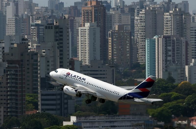 A LATAM Airlines plane takes off from Congonhas airport in Sao Paulo, Brazil September 11, 2017. Picture taken September 11, 2017. REUTERS/Paulo Whitaker - RC132ABE1500