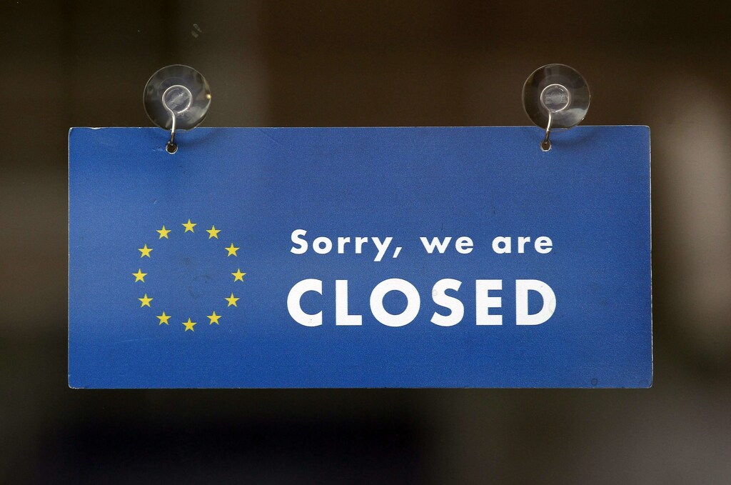 A sign is displayed on the door of the European Commission offices in Dublin January 19, 2012.