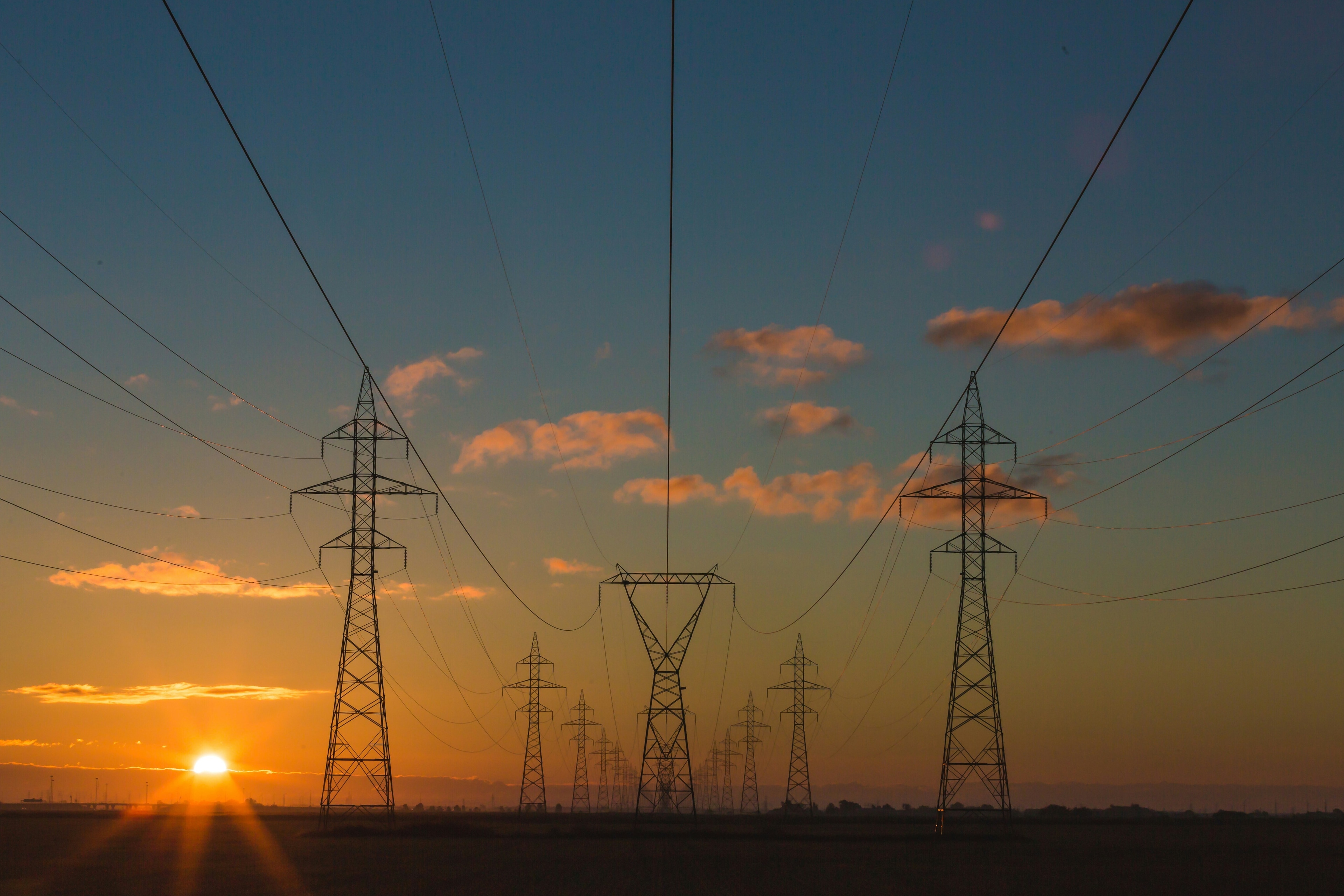 Power pylons at sunset.