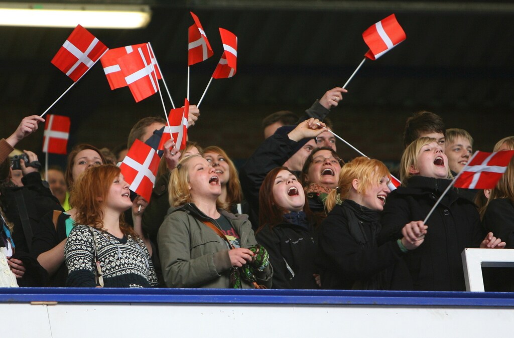 Football - Everton v Wigan Athletic Barclays Premier League - Goodison Park - 08/09 - 5/4/09 Everton fans with Denmark flags in support of Lars Jacobsen Mandatory Credit: Action Images / Carl Recine NO ONLINE/INTERNET USE WITHOUT A LICENCE FROM THE FOOTBALL DATA CO LTD. FOR LICENCE ENQUIRIES PLEASE TELEPHONE +44 (0) 207 864 9000. - MT1ACI5878265
