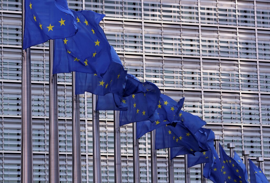 European Union flags fly outside the European Commission headquarters in Brussels, Belgium, February 19, 2020. Picture taken February 19, 2020 REUTERS/Yves Herman - RC274F9T78R4