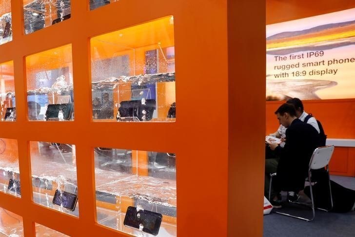 Chinese-made waterproof smartphones are on display during Global Sources Mobile Electronics show, in Hong Kong, China April 18, 2018. REUTERS/Tyrone Siu