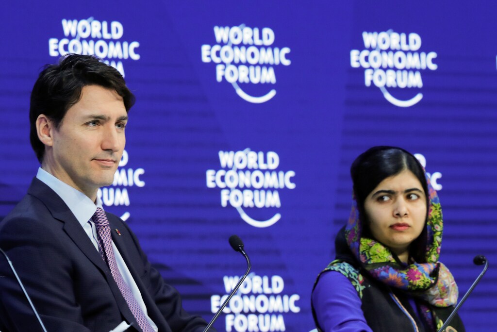 Canada's Prime Minister Justin Trudeau and Nobel laureate Malala Yousafzai at the 2018 World Economic Forum annual meeting in Davos