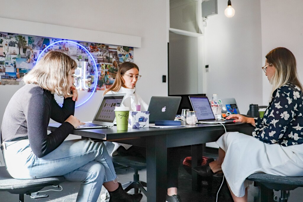 Gender bias: Women working on laptops.