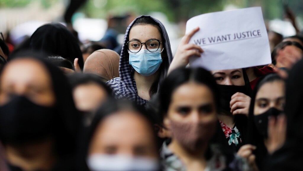 Afghan nationals attend a protest outside the United Nations High Commissioner for Refugees (UNHCR) office to urge the international community to help Afghan refugees, in New Delhi, India, September 1, 2021. REUTERS/Adnan Abidi - RC2YGP99YZTS