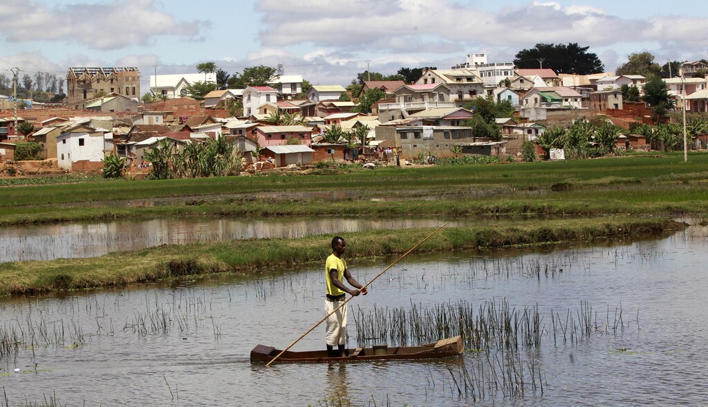 A man travels in a boat to fish waters on the outskirts of Madagascar's capital Antananarivo.