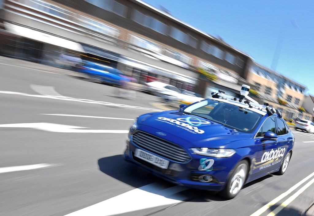 A passenger vehicle is seen traveling autonomously using Oxbotica software during a trial on public roads in Oxford, Britain, June 27, 2019. Picture taken June 27, 2019.