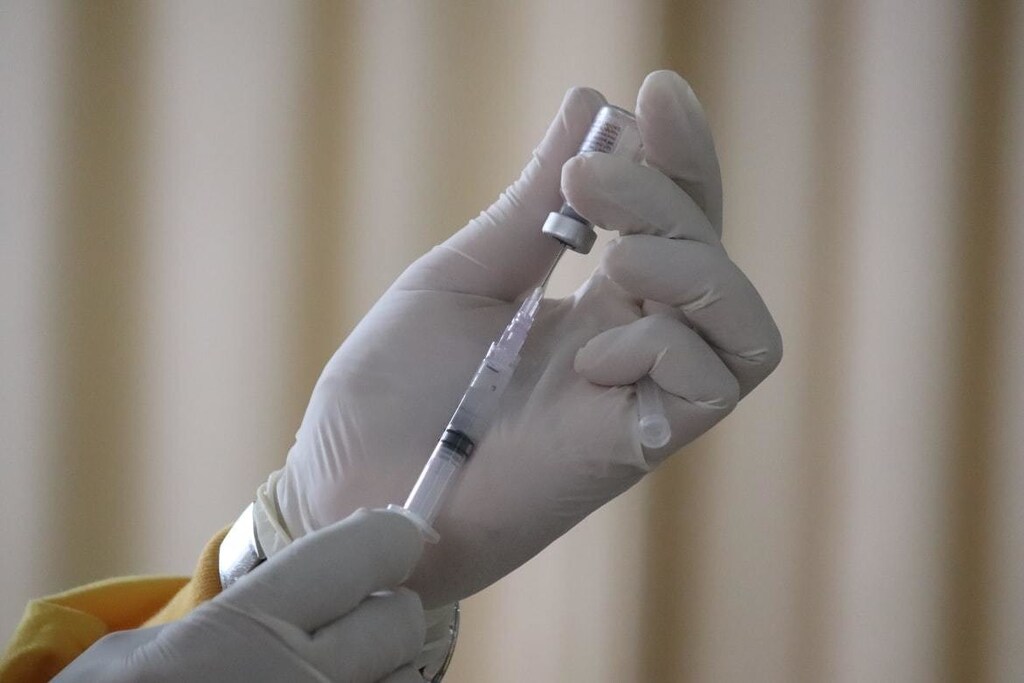 Taking-sinovac-covid-19-booster-shot-vaccination-injection.