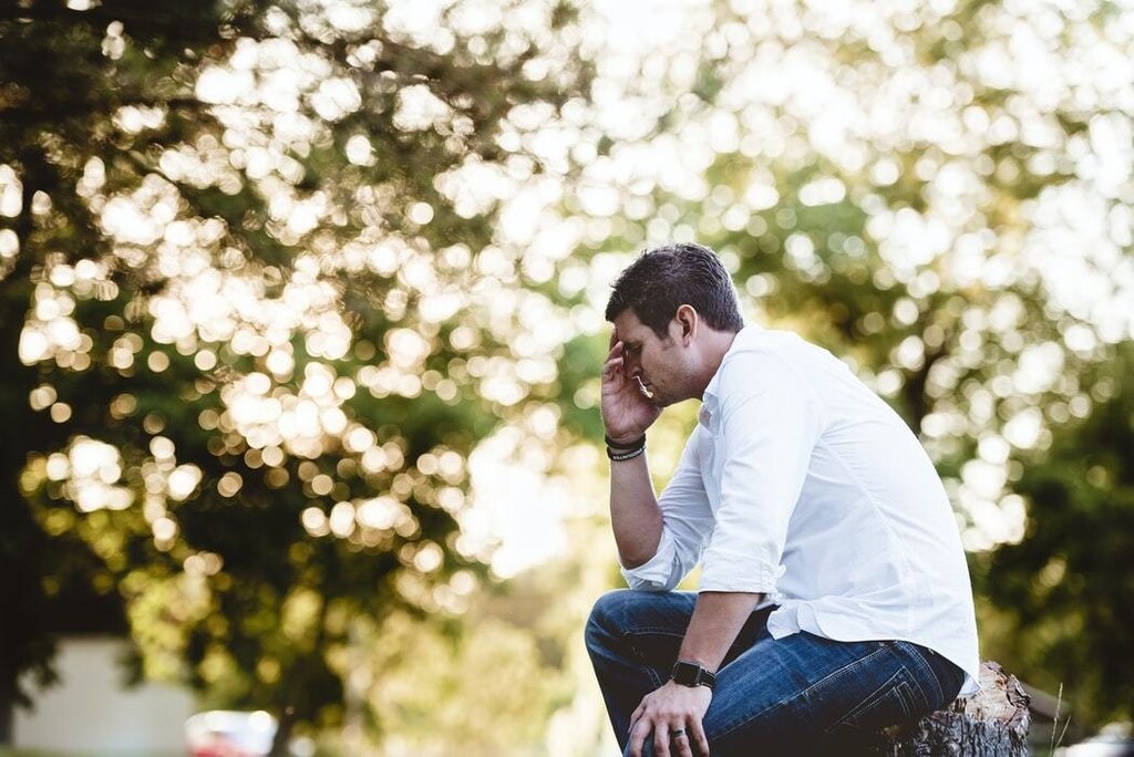 image of a man looking stressed