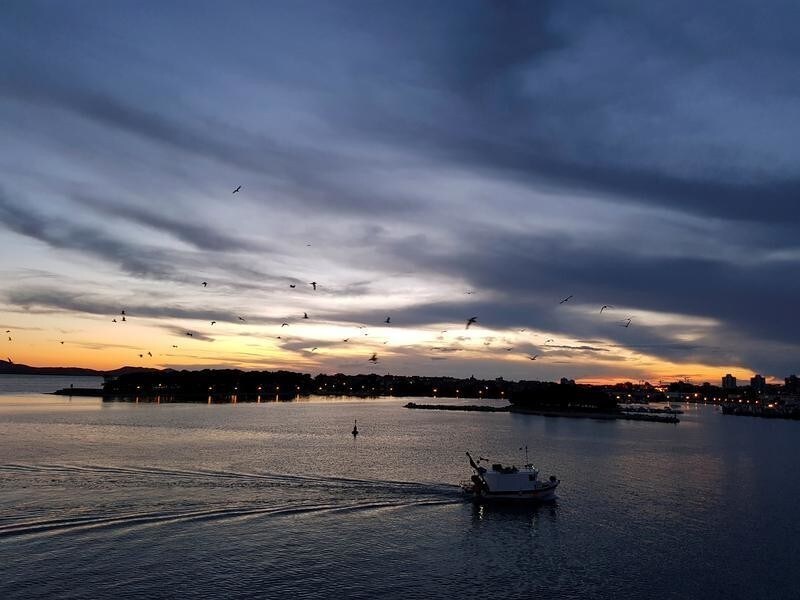 A fishing boat is seen at Gazenica port during sunset in Zadar, Croatia May 18, 2018.