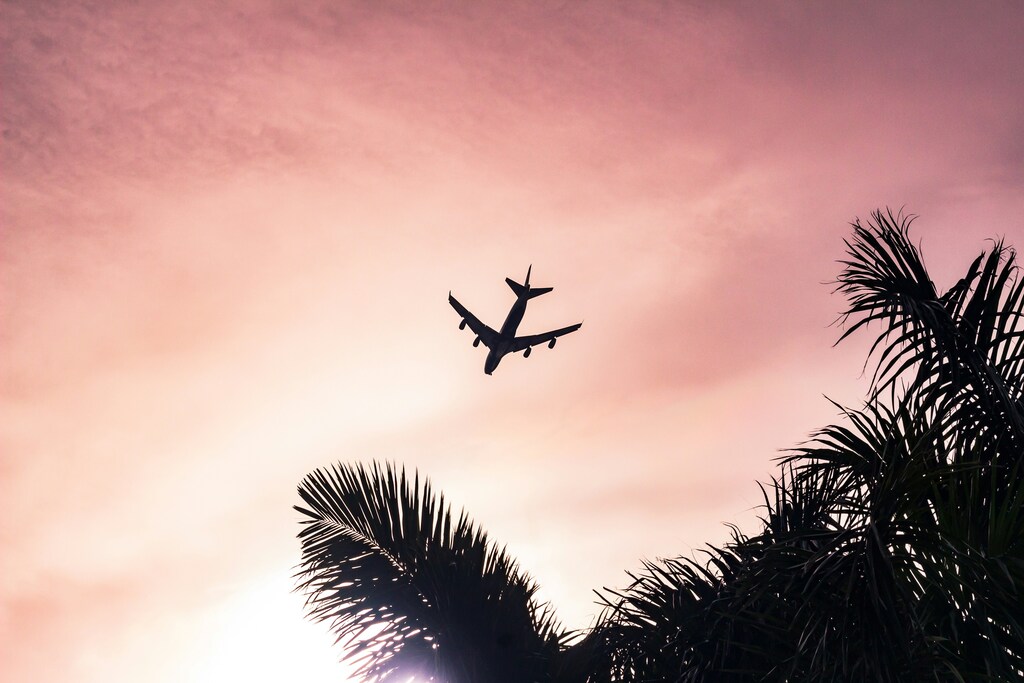 A plane flying across Miami Beach, United States.