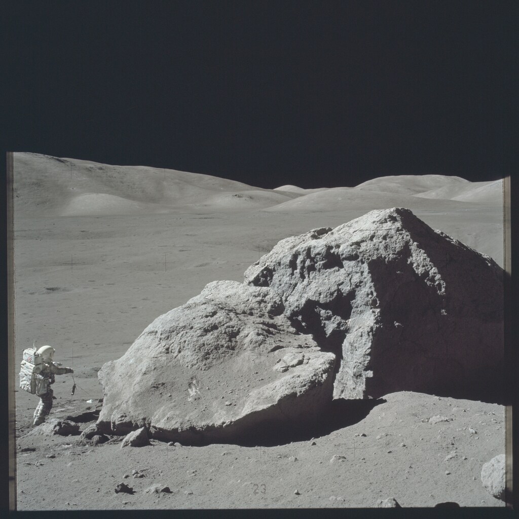 Scientist-astronaut Harrison H. Schmitt is photographed standing next to a huge, split boulder during the third Apollo 17 extravehicular activity (EVA) at the Taurus-Littrow landing site on the moon during the Apollo 17 mission in this December 13, 1972 NASA handout photo. The photograph is one of more than 12,000 from NASA's archives recently aggregated on the Project Apollo Archive Flickr account. REUTERS/NASA/Handout via Reuters THIS IMAGE HAS BEEN SUPPLIED BY A THIRD PARTY. IT IS DISTRIBUTED, EXACTLY AS RECEIVED BY REUTERS, AS A SERVICE TO CLIENTS. FOR EDITORIAL USE ONLY. NOT FOR SALE FOR MARKETING OR ADVERTISING CAMPAIGNS - RTSK368
