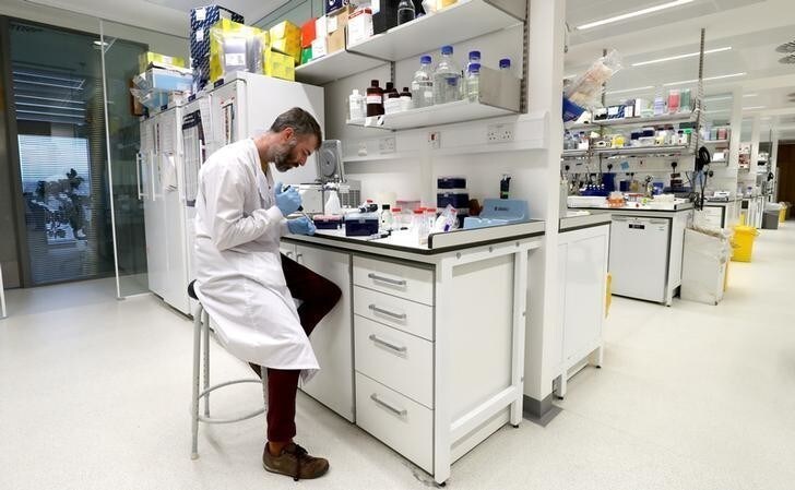 Dr Chris Millington, an investigator scientist, works in the lab at MRC Laboratory of Molecular Biology in Cambridge, Britain January 2, 2018. Picture taken January 2, 2018. REUTERS/Chris Radburn