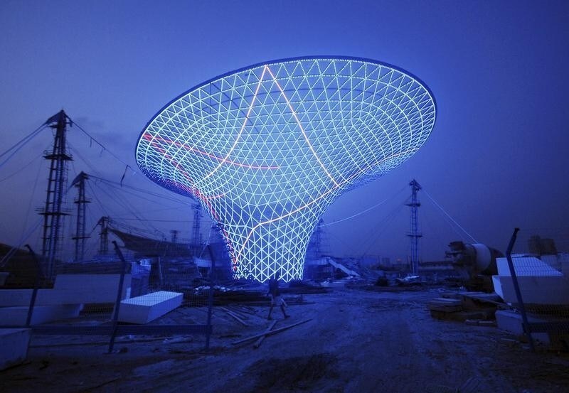 A view shows a lighting test at the "Sun Valley" at the 2010 World Expo site in Shanghai, August 17, 2009. The Shanghai Expo, with the theme of "Better City, Better Life", is scheduled to be held from May 1 to October 31, 2010. So far, 191 nations and 48 international organizations have officially confirmed their participation in the Expo, according to Xinhua News Agency. Picture taken August 17, 2009. REUTERS/China Daily (CHINA ANNIVERSARY SCI TECH IMAGES OF THE DAY) CHINA OUT. NO COMMERCIAL OR EDITORIAL SALES IN CHINA - RTR26U00