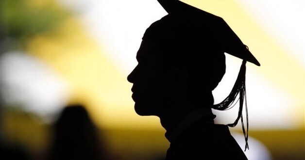 Image: Profile of students taking their seats for the diploma ceremony at Harvard University in Cambridge