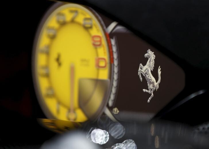 The control panel is pictured inside the new LaFerrari hybrid car on the Ferrari booth during the second media day of the 83rd Geneva Car Show at the Palexpo Arena in Geneva March 6, 2013. REUTERS/Denis Balibouse/File Photo GLOBAL BUSINESS WEEK AHEAD PACKAGE - SEARCH 'BUSINESS WEEK AHEAD MAY 2' FOR ALL IMAGES