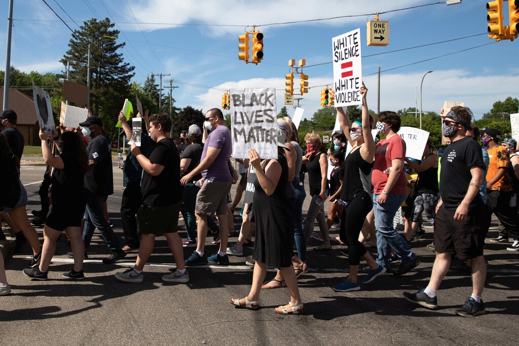 Citizens of Detroit protest against racial inequality.