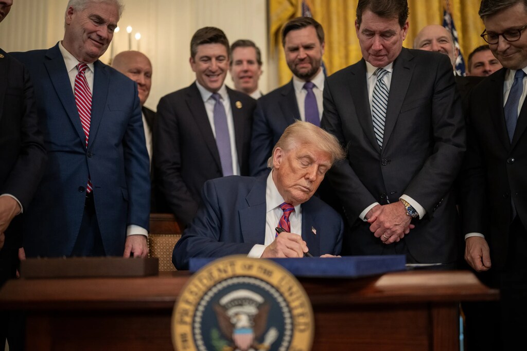 US President Donald Trump signs the GENIUS Act into law in July 2025