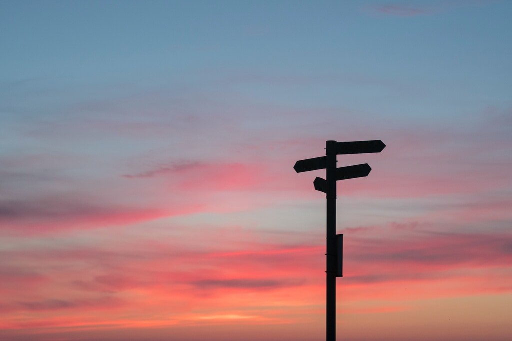 Silhouette of road signs.