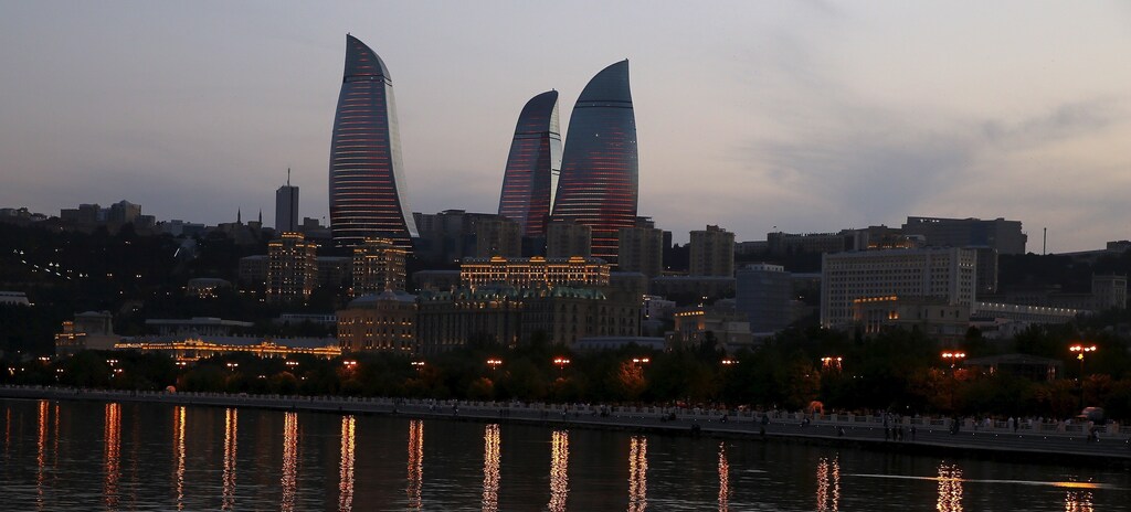 The skyline, with the Flame Towers, of Baku is seen at sunset, Azerbaijan June 18, 2015.