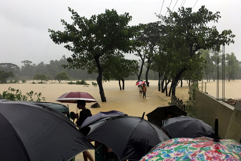 A road is flooded after heavy rain in Coxs Bazar, Bangladesh, July 25, 2018. REUTERS/Clare Baldwin TPX IMAGES OF THE DAY - RC14FC6A29A0