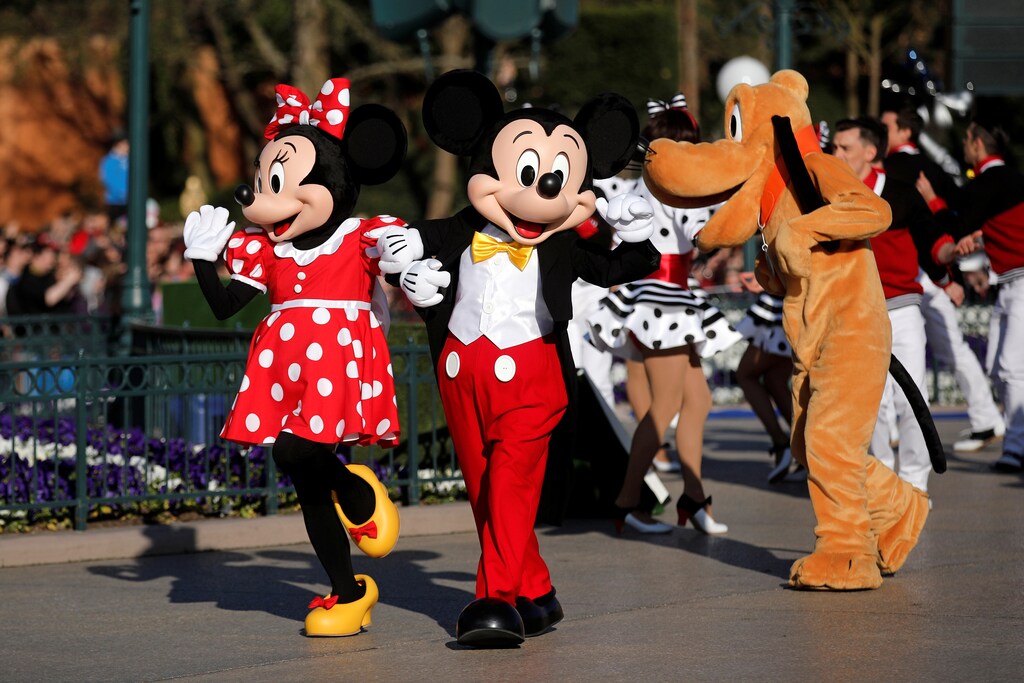 Disney characters Mickey Mouse and Minnie Mouse attend the 25th anniversary of Disneyland Paris at the park in Marne-la-Vallee, near Paris, France, April 12, 2017. REUTERS/Benoit Tessier - RC1848967030