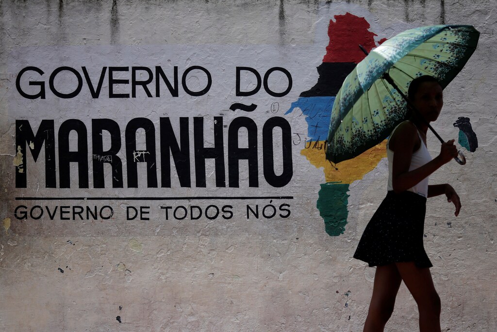 A woman leaves a polling station during municipal elections in Sao Luis, Brazil, October 2, 2016. REUTERS/Ueslei Marcelino - RTSQFMT