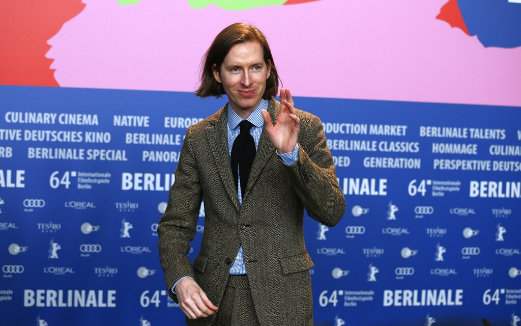 Director Wes Anderson gestures during a press conference to promote the movie "The Grand Budapest Hotel" at the 64th Berlinale International Film Festival in Berlin February 6, 2014. REUTERS/Thomas Peter (GERMANY - Tags: ENTERTAINMENT) - RTX18AV5