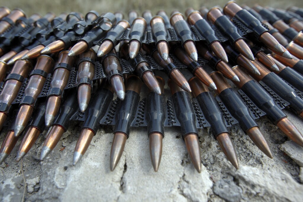 Bullets are placed on a stone at a checkpoint controlled by the Ukrainian army near the town of Debaltseve, Donetsk Region August 6, 2014. REUTERS/Valentyn Ogirenko (UKRAINE - Tags: CIVIL UNREST CONFLICT MILITARY TRANSPORT) - GM1EA8701MF01