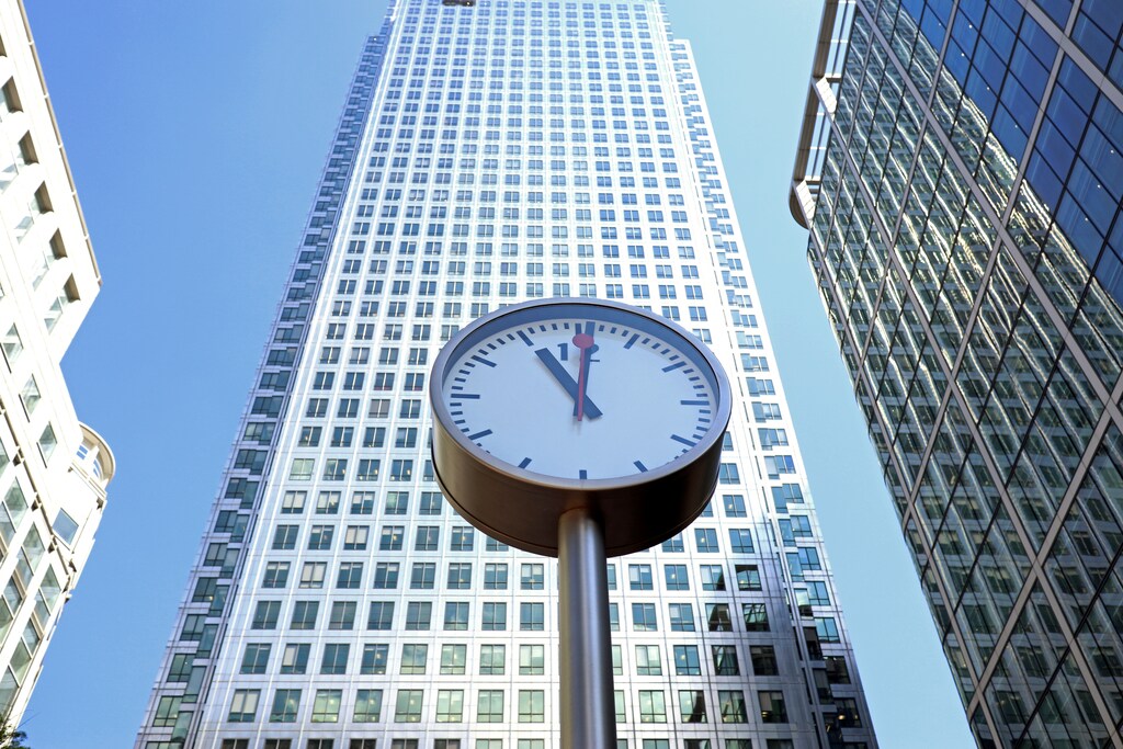 A clock is seen in London's Financial centre at Canary Wharf In London, Britain.
