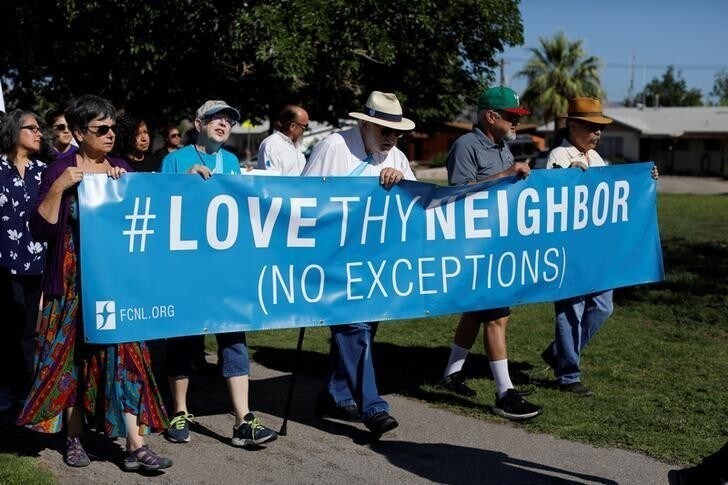 People protest against the Trump administration policy of separating immigrant families suspected of illegal entry, in El Paso, Texas, U.S., June 19, 2018. REUTERS/Mike Blake