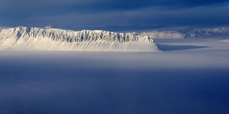 Eureka Sound on Ellesmere Island in the Canadian Arctic is seen in a NASA Operation IceBridge survey picture taken March 25, 2014. IceBridge is a six-year NASA airborne mission which will provide a yearly, multi-instrument look at the behavior of the Greenland and Antarctic ice, according to NASA. Picture taken March 25, 2014. REUTERS/NASA/Michael Studinger/Handout (CANADA - Tags: SCIENCE TECHNOLOGY ENVIRONMENT) ATTENTION EDITORS - THIS PICTURE WAS PROVIDED BY A THIRD PARTY. REUTERS IS UNABLE TO INDEPENDENTLY VERIFY THE AUTHENTICITY, CONTENT, LOCATION OR DATE OF THIS IMAGE. THIS PICTURE IS DISTRIBUTED EXACTLY AS RECEIVED BY REUTERS, AS A SERVICE TO CLIENTS. FOR EDITORIAL USE ONLY. NOT FOR SALE FOR MARKETING OR ADVERTISING CAMPAIGNS - RTR3KGVN
